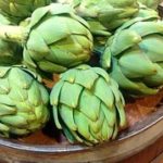 artichokes in glass bowl