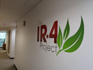 IR-4 Project logo on the wall of the new NC State headquarters.