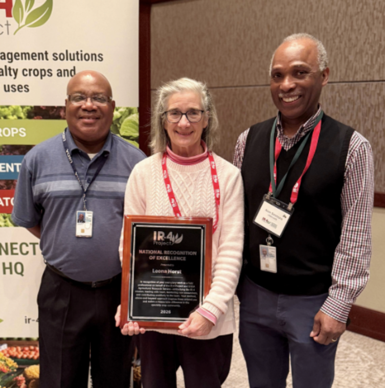 The National Recognition of Excellence being awarded to Leona Horst pictured with Joe Munyaneza and Alvin Simmons.